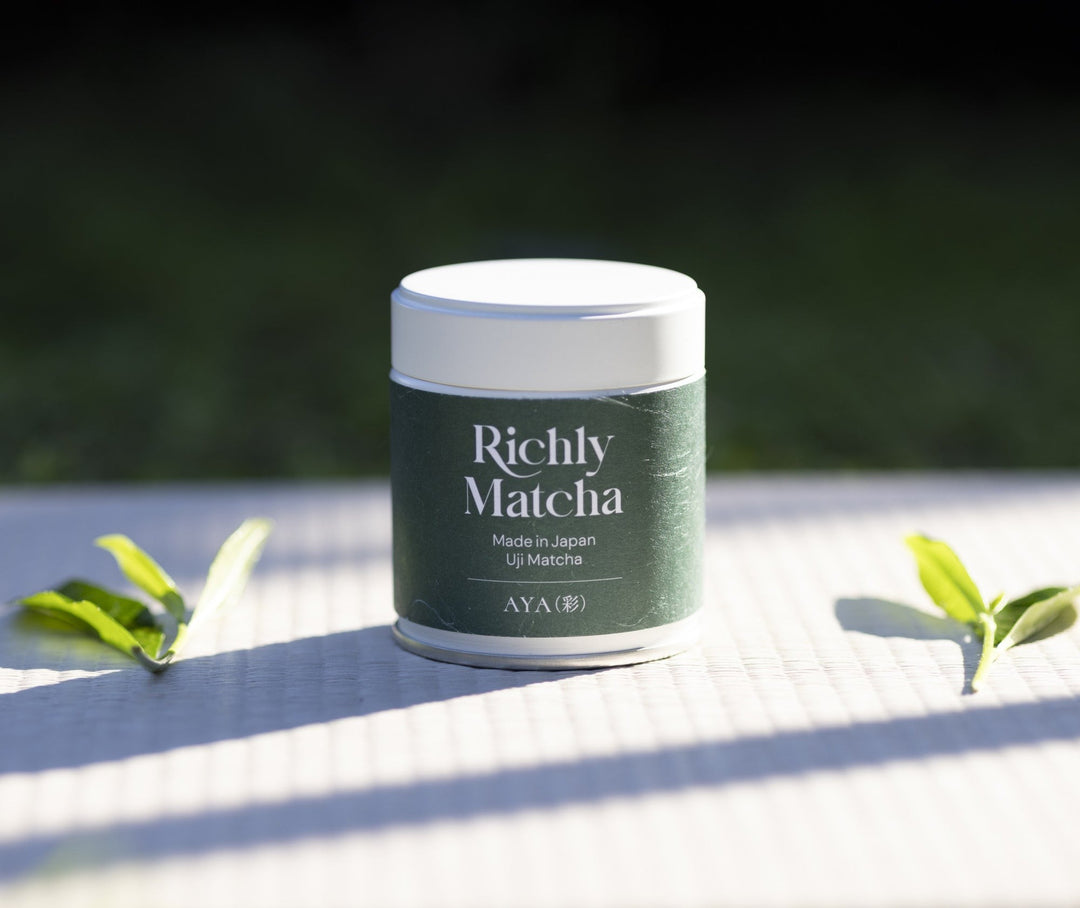 AYA Uji matcha tin with fresh tea leaves